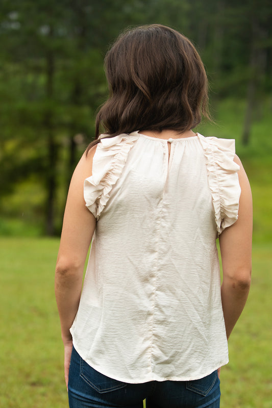 Cream Colored Ruffled Sleeveless Top